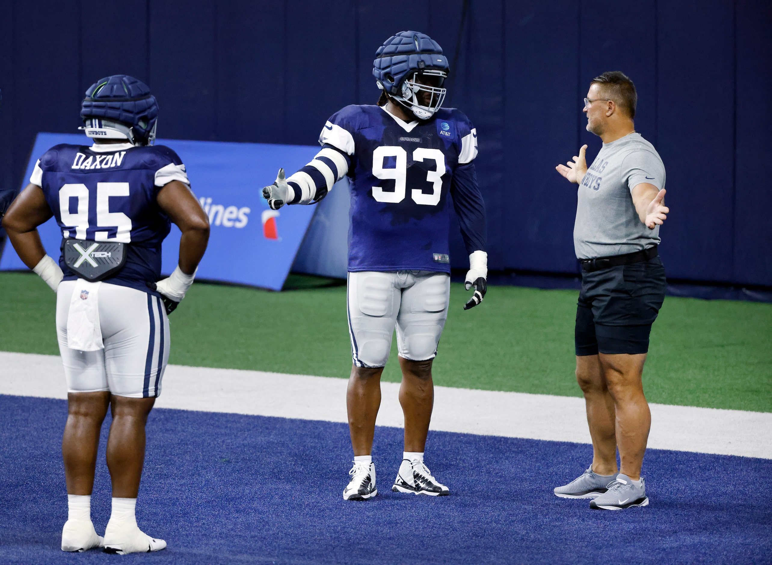 Dallas Cowboys defensive tackle Linval Joseph (93) works with defensive line coach Jeff...