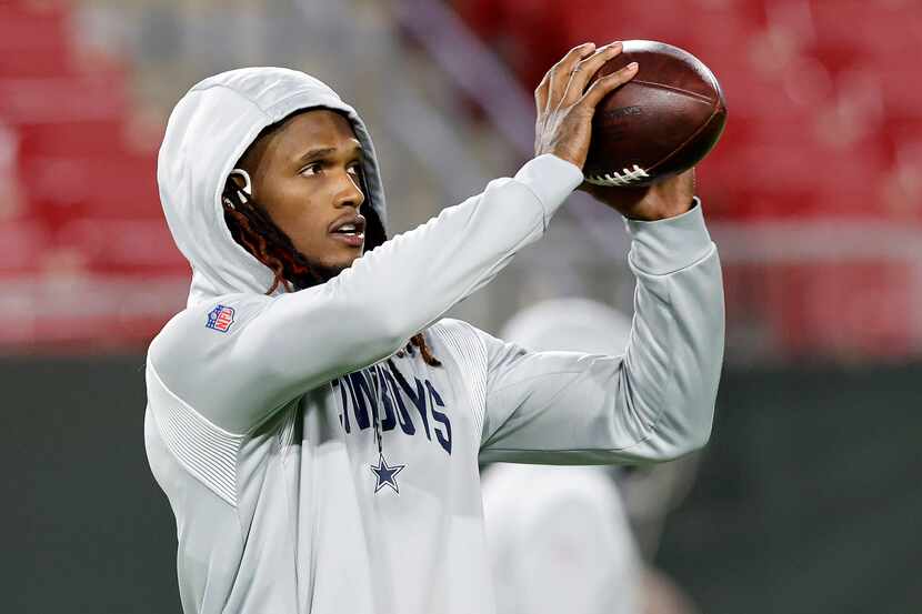 Dallas Cowboys wide receiver CeeDee Lamb (88) catches the ball during warmups before a Wild...