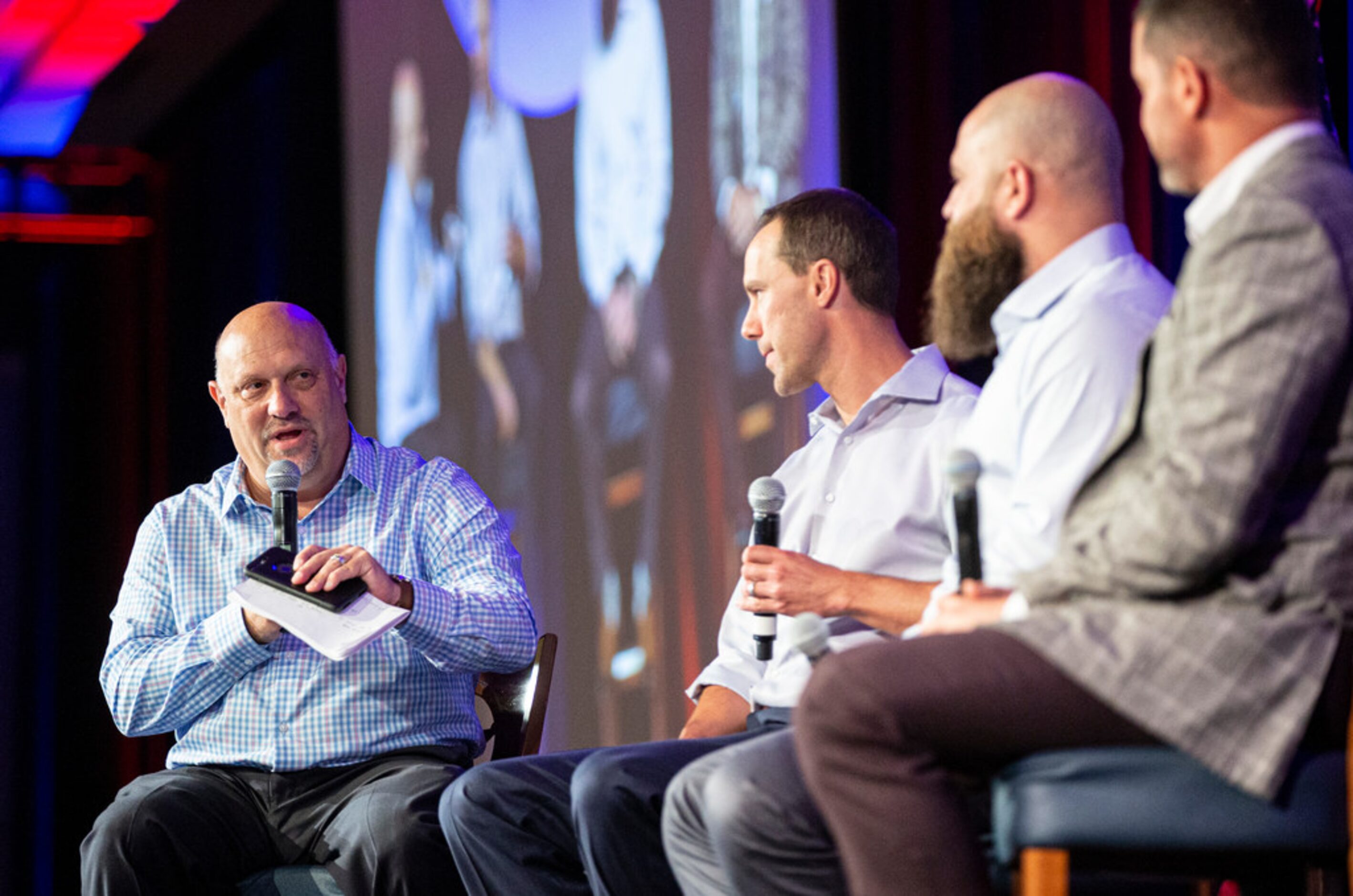 Texas Rangers beat writer Evan Grant, left, asks former players David Murphy, second from...