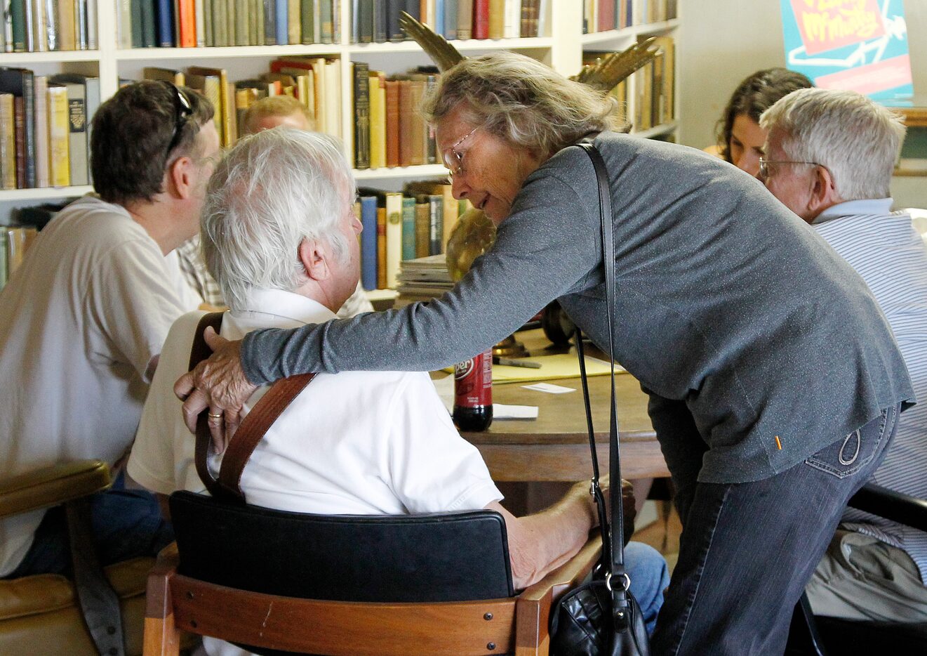 Faye McMurtry, right, talks to her husband Larry McMurtry in one of his bookstores in...