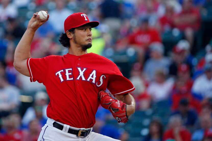 Texas Rangers pitcher Yu Darvish throws in the first inning against the Houston Astros at...