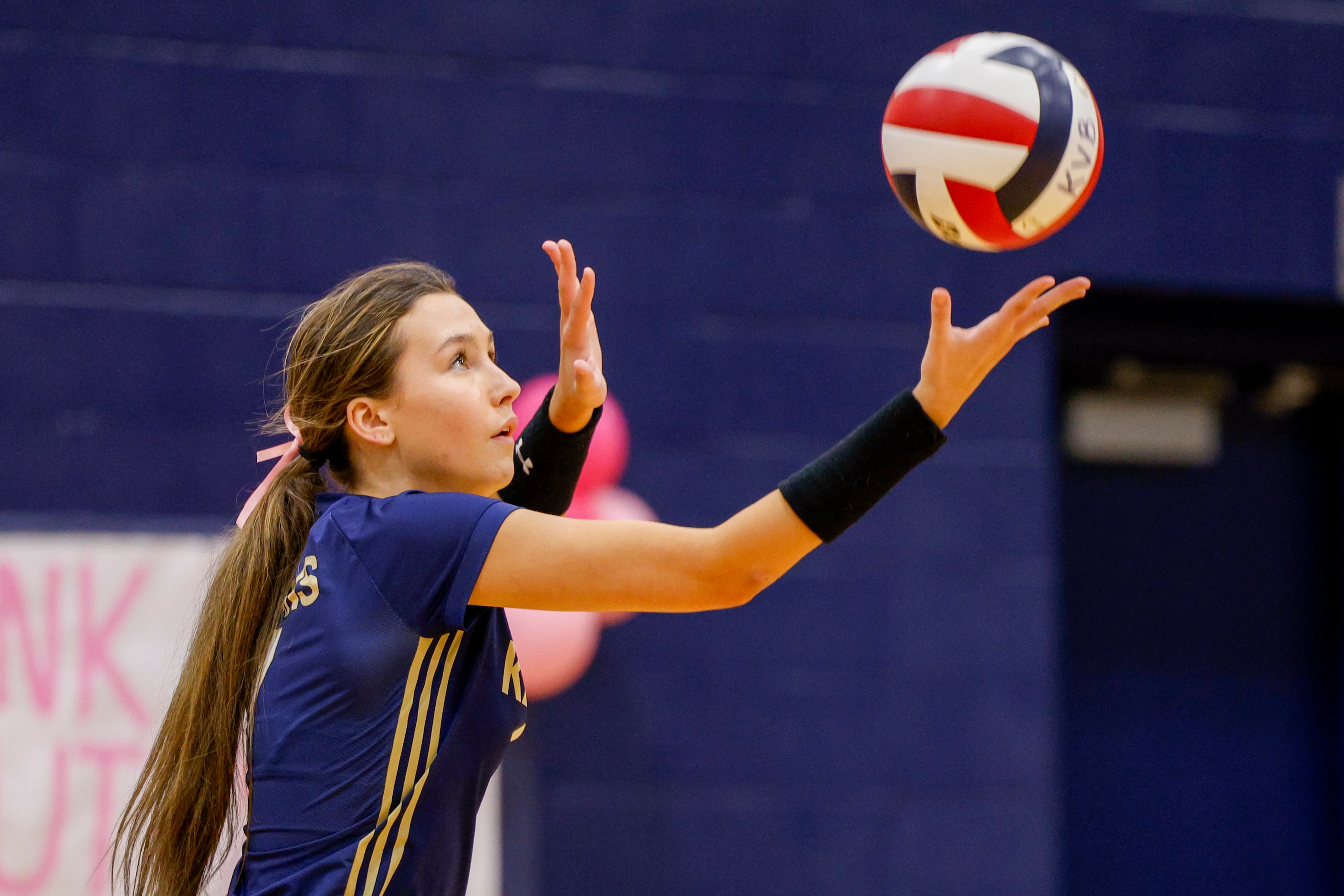 Keller's Carley Wright (7) serves the ball during a high school volleyball match against...