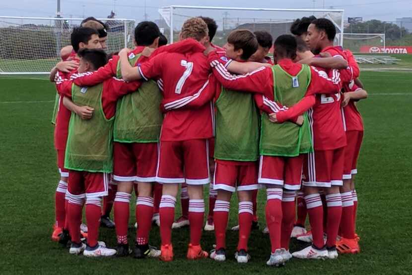 FC Dallas Academy U14s huddle up before playing Real Oviedo in the Dallas Cup. (3-28-18)