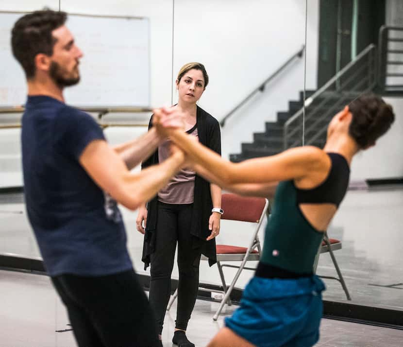 Hailey Von Schlehenried (center) watches dancers Riley Moyano and Amanda Fairweather of...