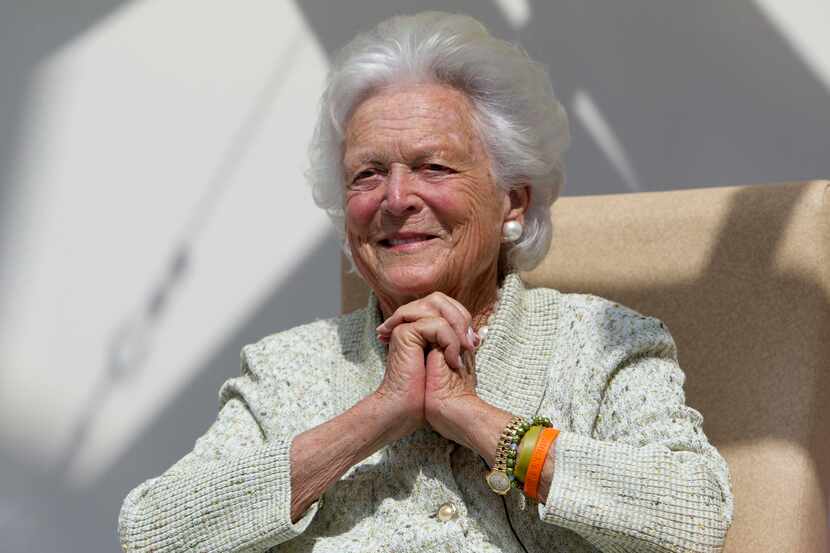 FILE - In a Thursday, Aug. 22, 2013 file photo, former first lady Barbara Bush listens to a...