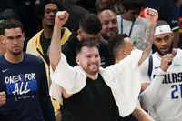 Dallas Mavericks guard Luka Doncic celebrates after a victory over the Oklahoma City Thunder...