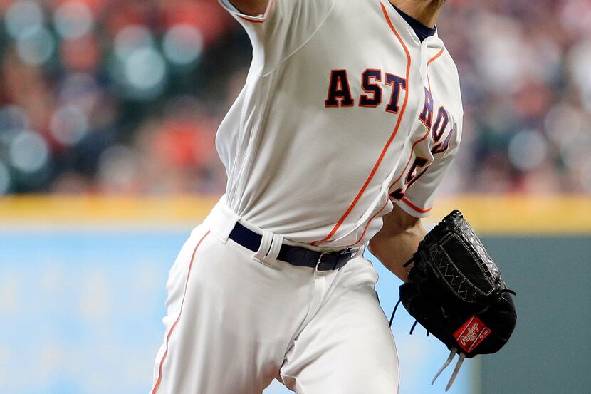 Houston Astros starting pitcher Charlie Morton throws against the Texas Rangers during the...