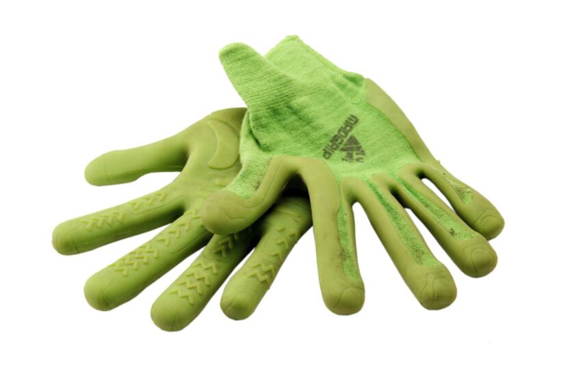 A pair of gardening gloves at DMN studio in Dallas, TX on December 28, 2012.