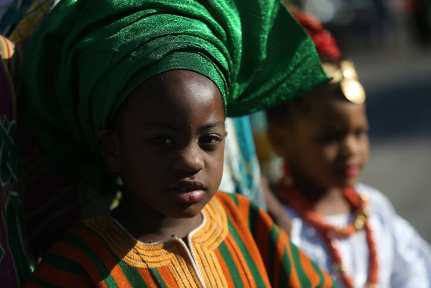 Ndidi Ogbechie, 6, and sister Opemide Ogbechie,  4, during activities at A Taste of Nigeria...