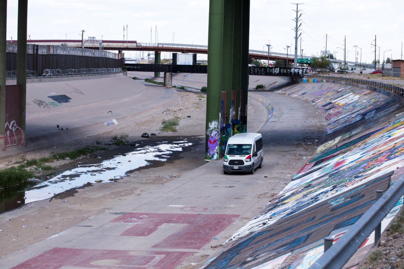 An Instituto Nacional de Migracion vehicle patrols the banks of the Rio Grande in Ciudad...