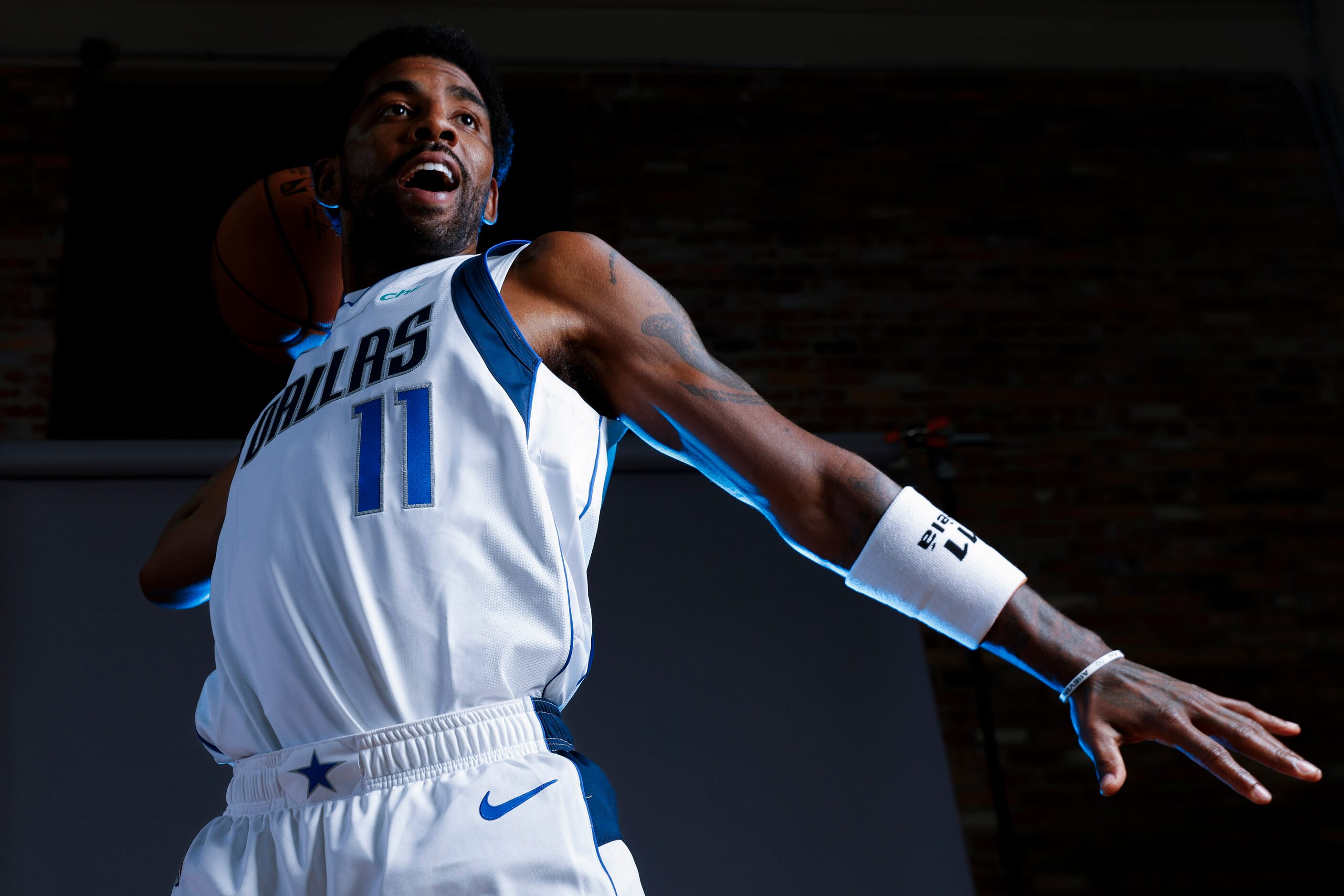 Dallas Mavericks’ Kyrie Irving poses for a photo during the media day on Friday, Sept. 29,...