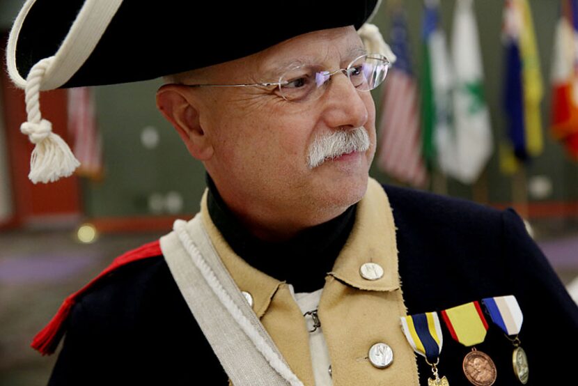  Blair Rudy, of Garland, Texas, stands in his Revolutionary garb at Haggard Library in...