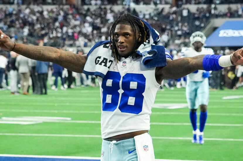 Dallas Cowboys wide receiver CeeDee Lamb (88) celebrates as he leaves the field after a 43-3...