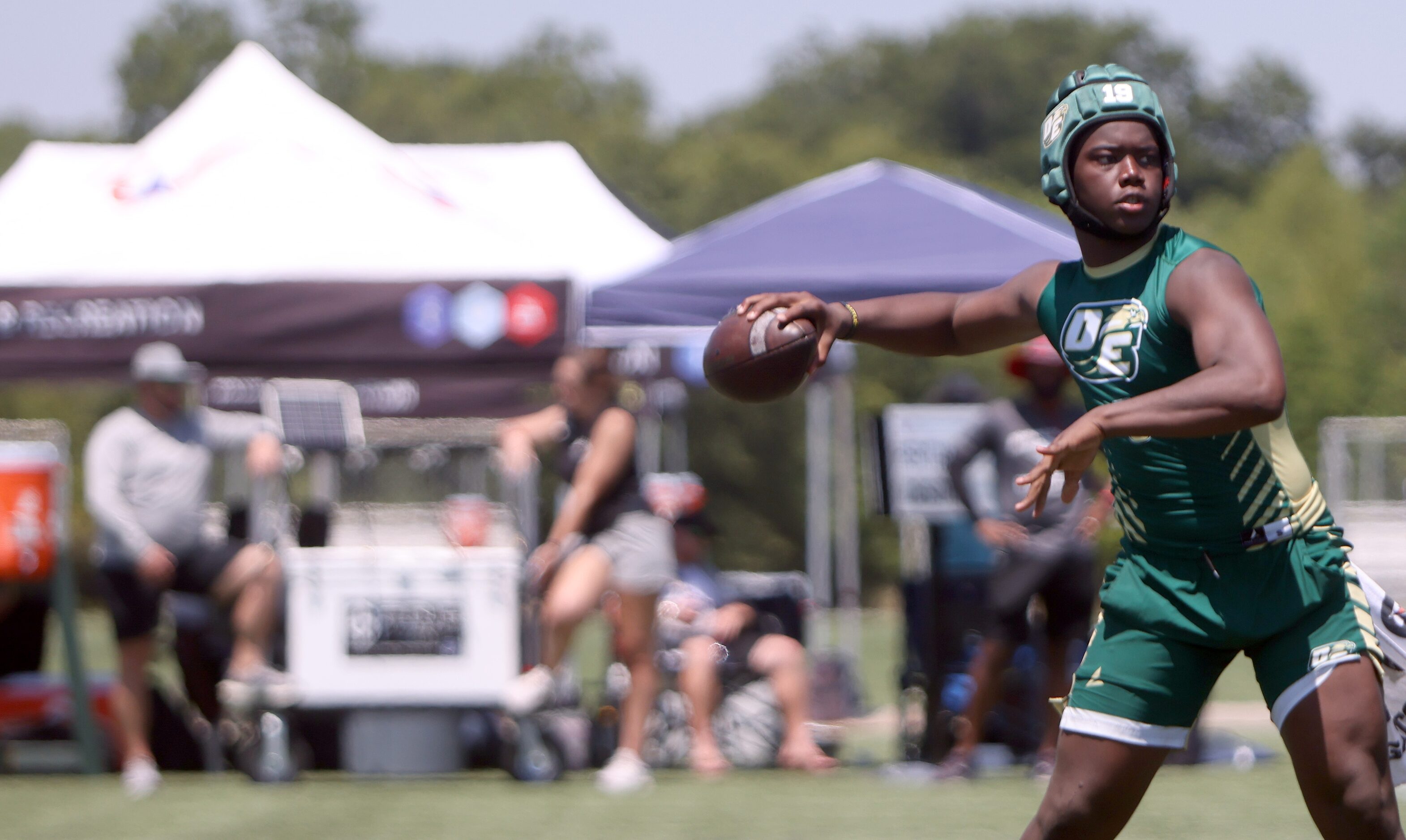 DeSoto quarterback DJ Bailey (5) delivers a pass during the tournament final game. DeSoto...