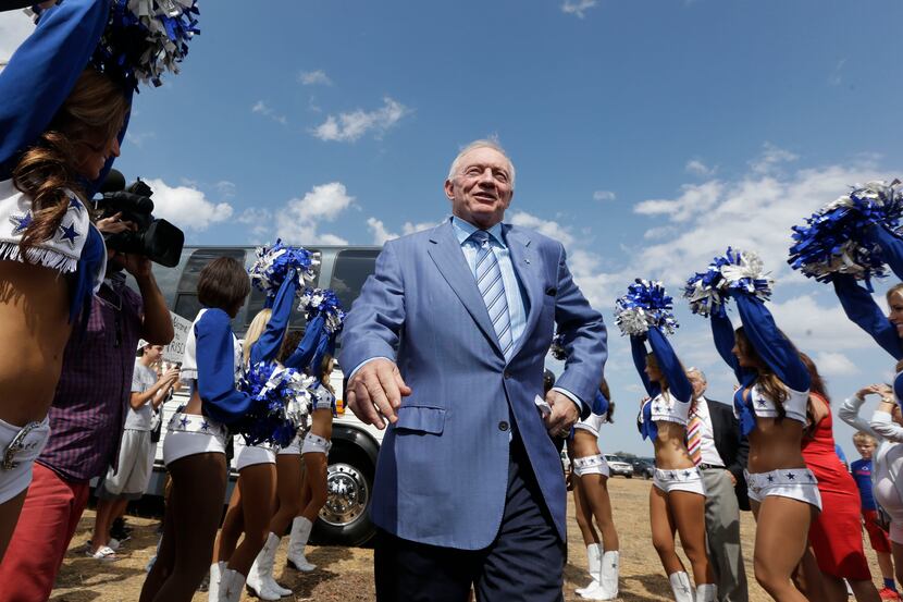 Dallas Cowboys owner Jerry Jones arrives for a news conference at the sight of the team's...
