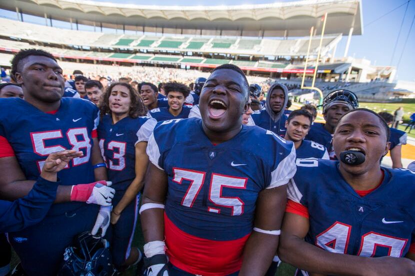 The Allen Eagles celebrate following their 31-24 win over The Woodlands in a Class 6A...