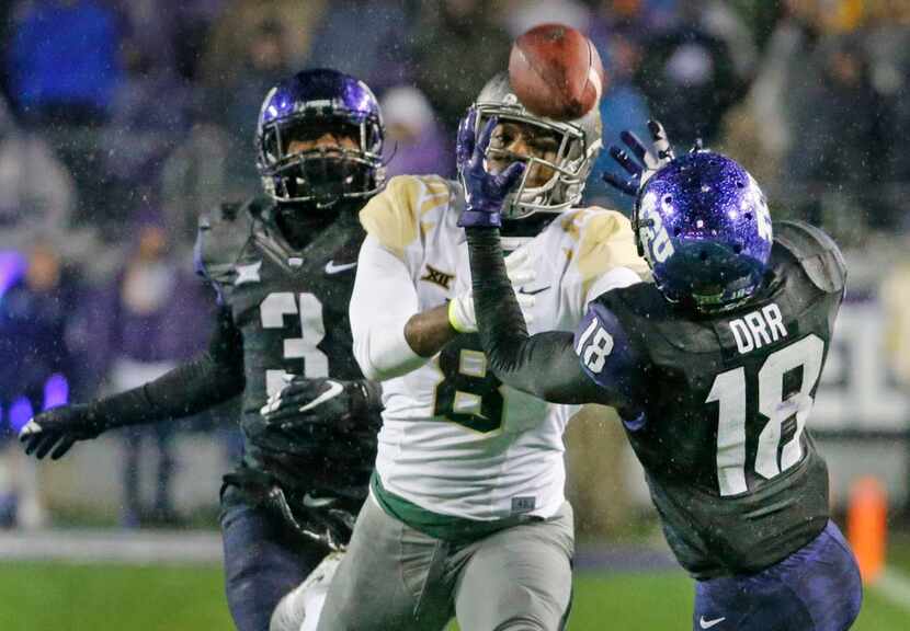 TCU Horned Frogs safety Nick Orr (18) intercepts a pass intended for Baylor Bears wide...