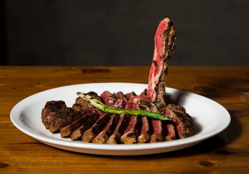 A 24-ounce, 45-day dry-aged Porterhouse steak at Town Hearth (Ashley Landis/The Dallas...