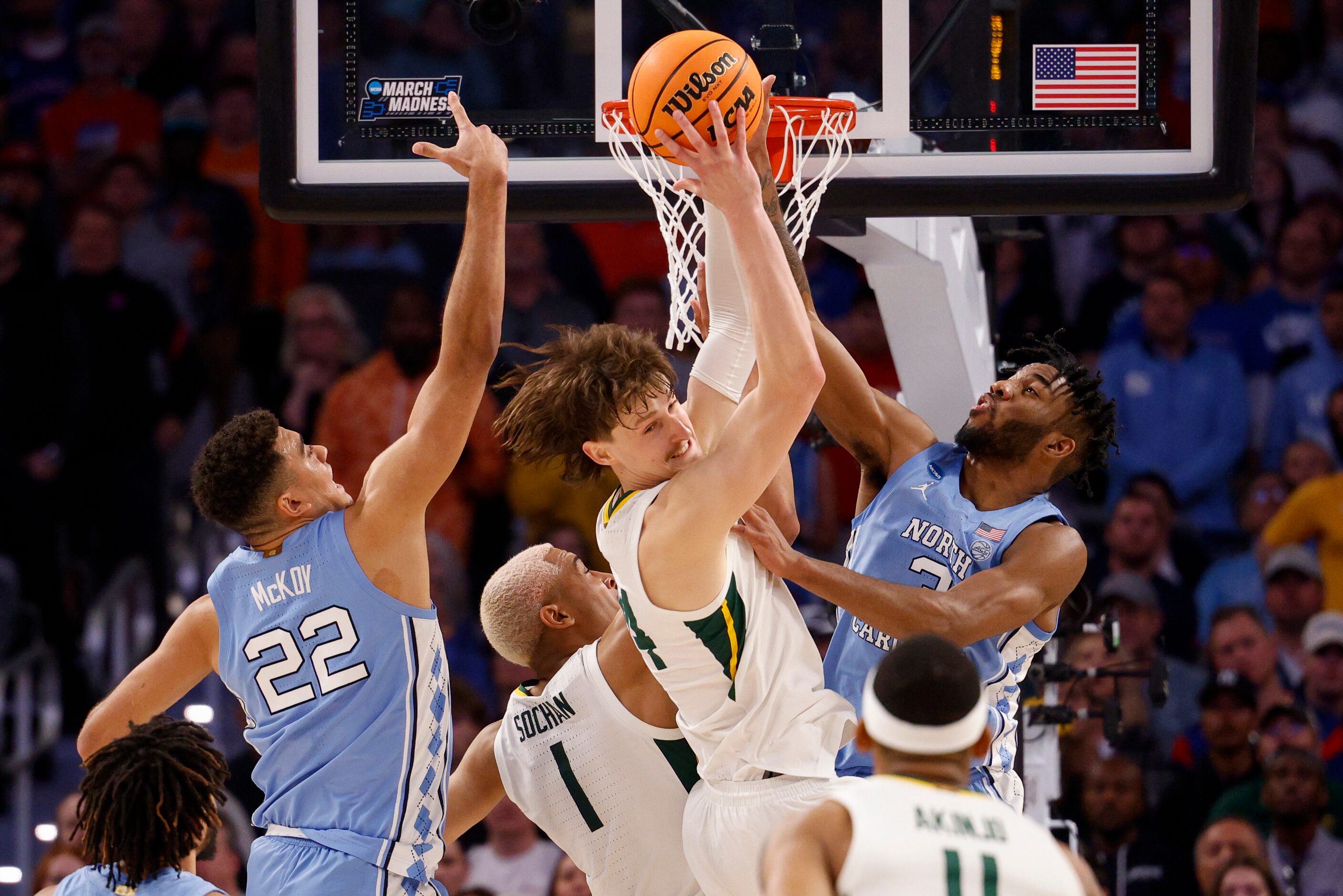 Baylor Bears guard Matthew Mayer (24) collets a rebound over North Carolina Tar Heels...