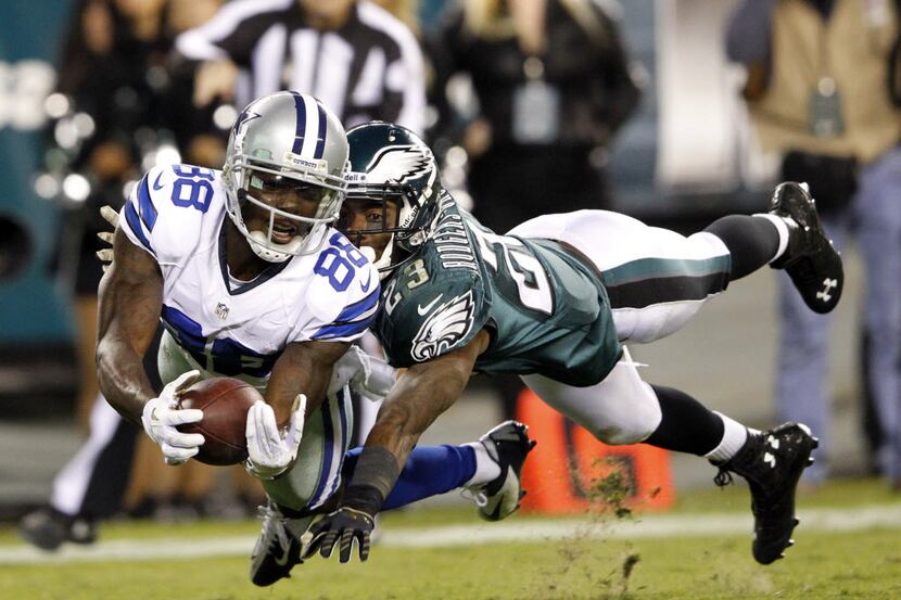 Dallas Cowboys wide receiver Dez Bryant (88) catches a touchdown pass in front of...