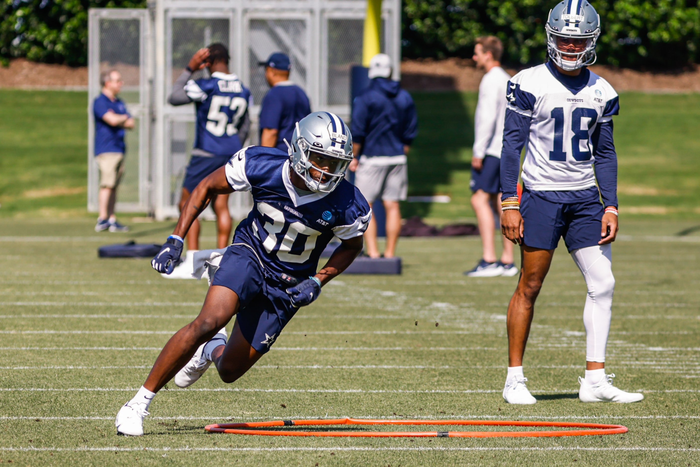 Dallas Cowboys cornerback (30) DaRon Bland and wide receiver (18) Jalen Tolbert during a...