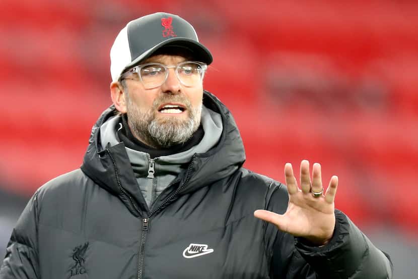 Liverpool's manager Jurgen Klopp gestures during the Champions League round of 16, first...