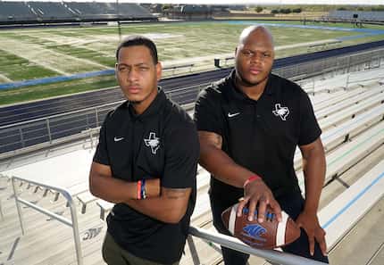 Coaches Chason Virgil and Demerick Gary on the football field at North Crowley High School...