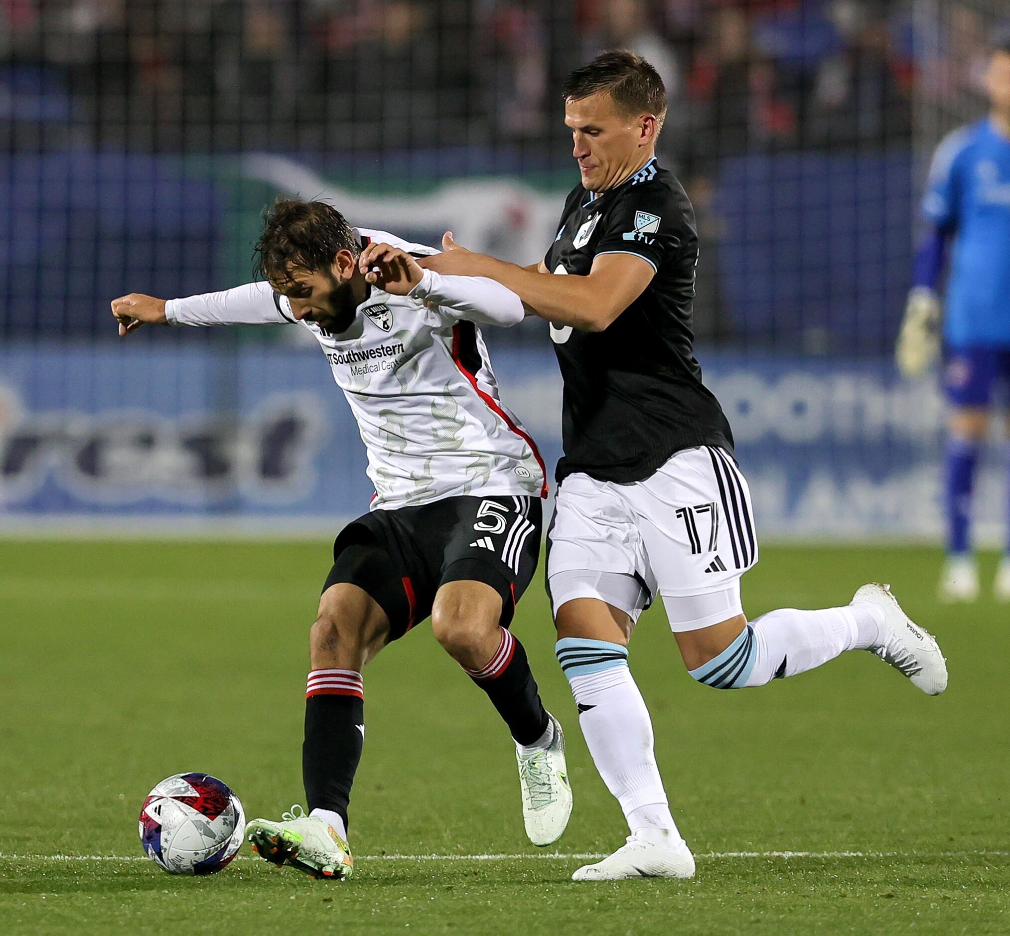 FC Dallas midfielder Facundo Quignon (5) tries to fight off Minnesota United midfielder...