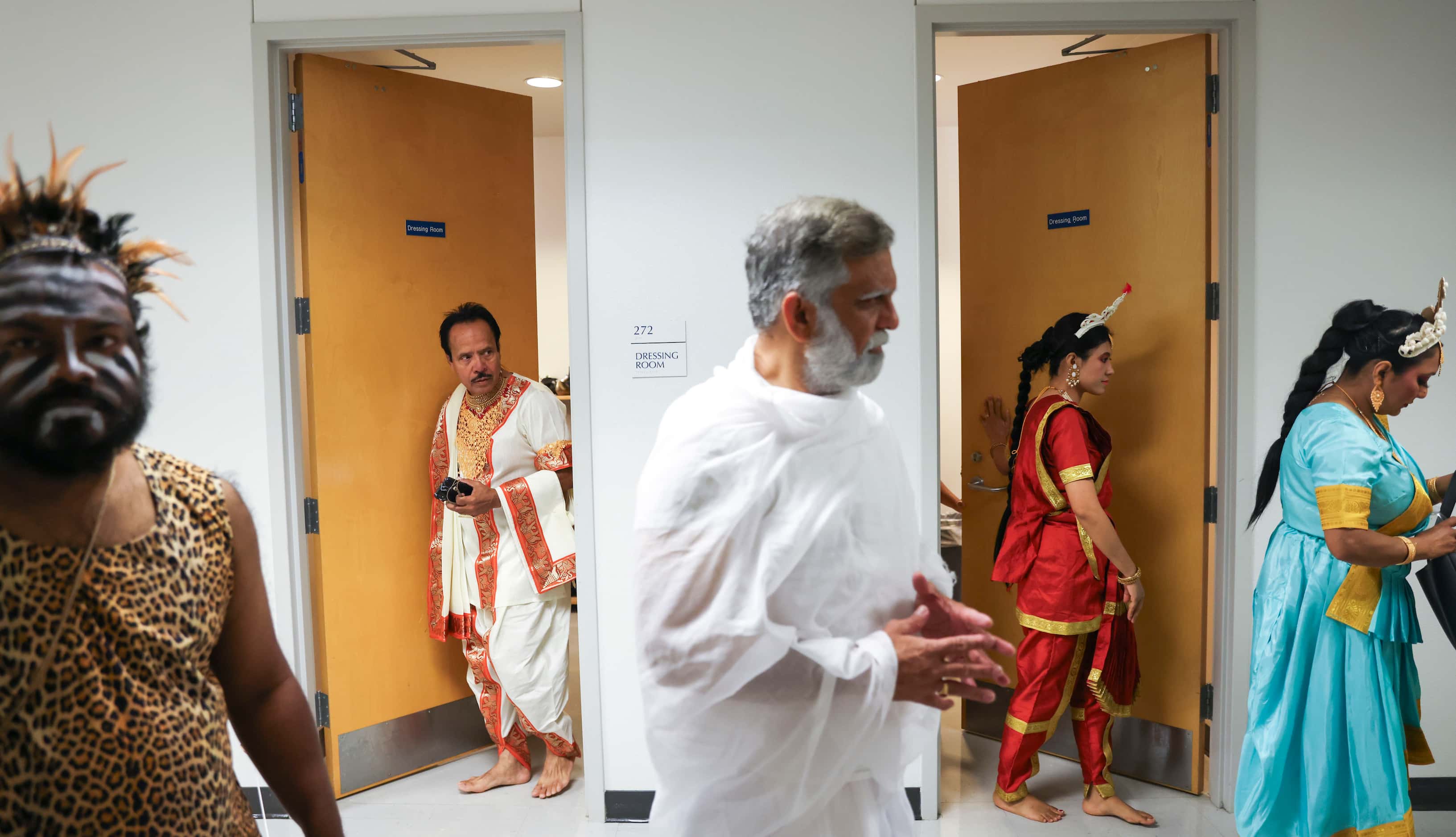 Cast members make their way out of the dressing room before the final show of the play,...