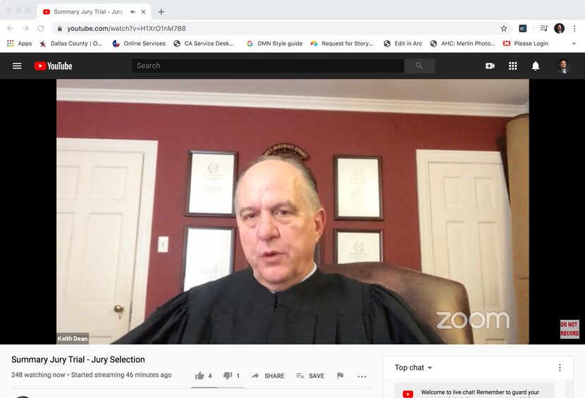 Retired judge Keith Dean speaks to potential jurors on a Zoom call for a summary jury trial...