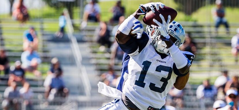 Dallas Cowboys wide receiver Lucky Whitehead (13) catches a pass as defensive back Jason...