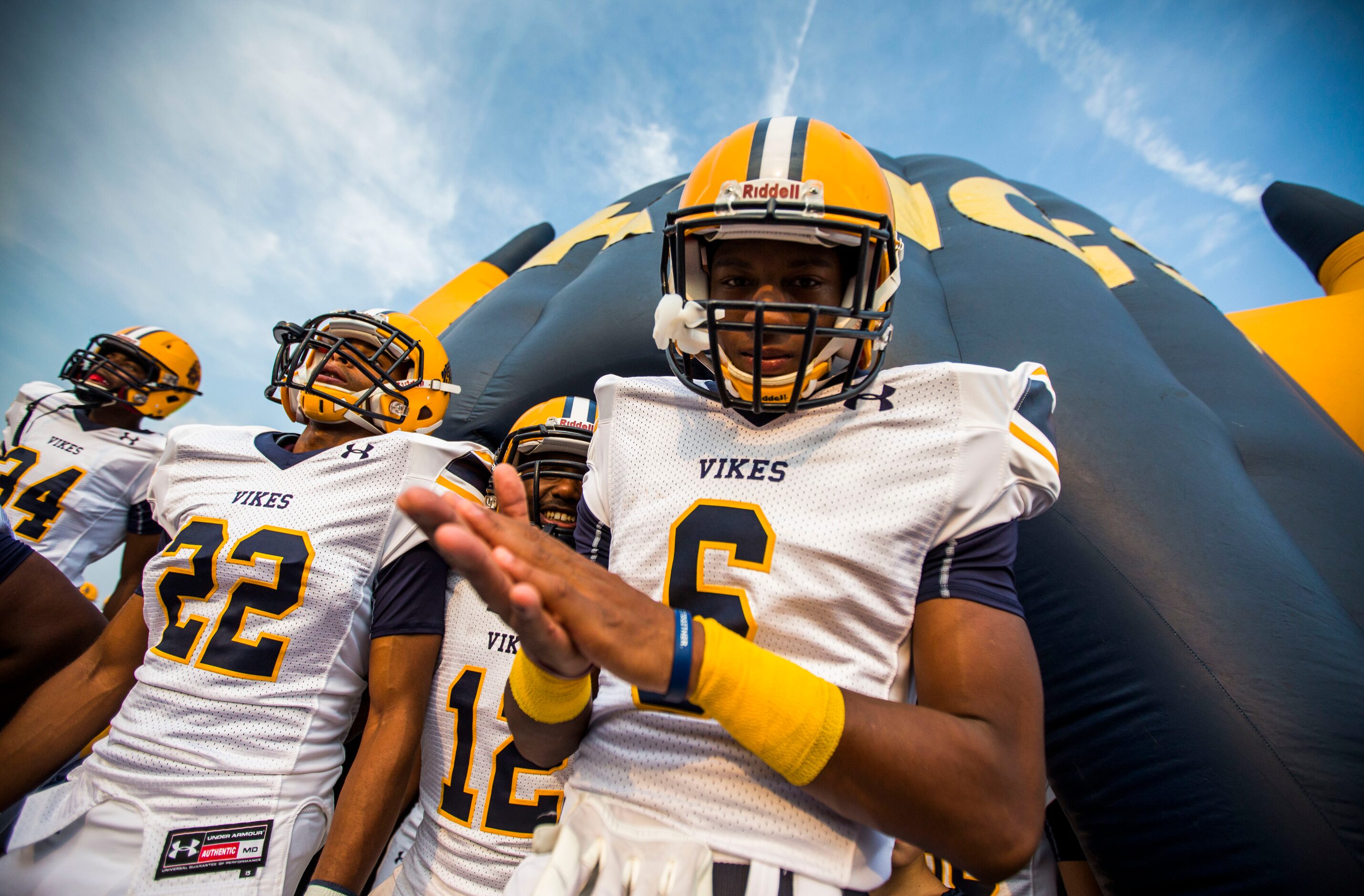 Arlington Lamar High School wide receiver Taron Owens and his team mates prepare for their...