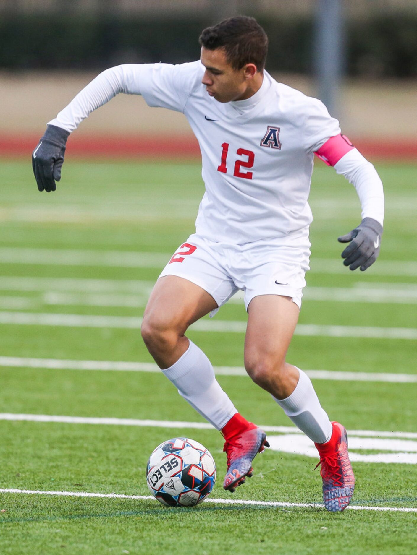 Allen's Edwin Shivers (12) receives a pass during Prosper's 1-0 win over Allen on Friday,...