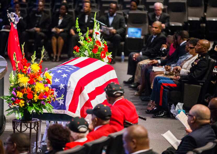 An American flag is draped over the casket of retired Army Air Corps 1st Lieutenant Calvin...