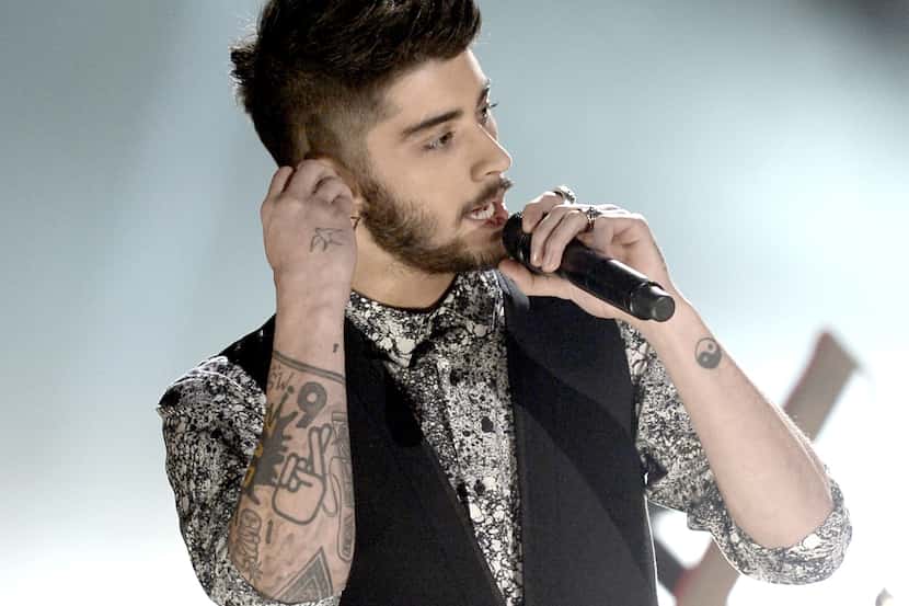 LOS ANGELES, CA - NOVEMBER 24:  Singer Zayn Malik of One Direction onstage during the 2013...