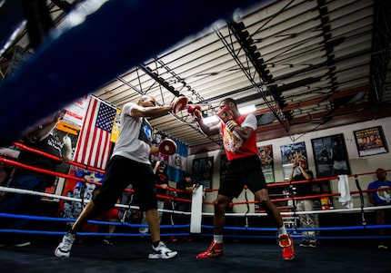 Number one ranked IBF Welterweight contender Errol Spence, Jr. works out with his trainer,...