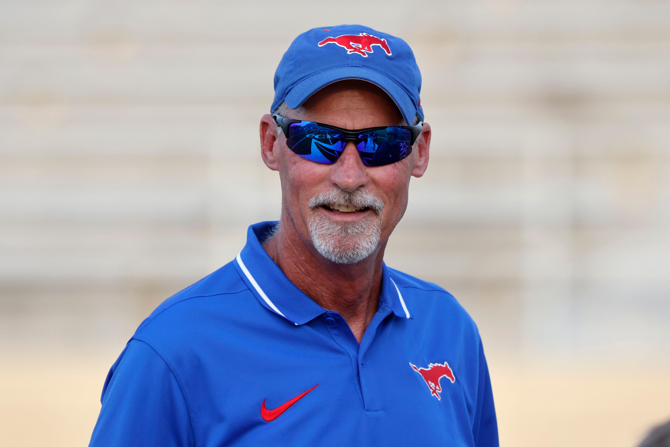 Grapevine head coach Bob Debesse stands on the field prior to a high school football game in...