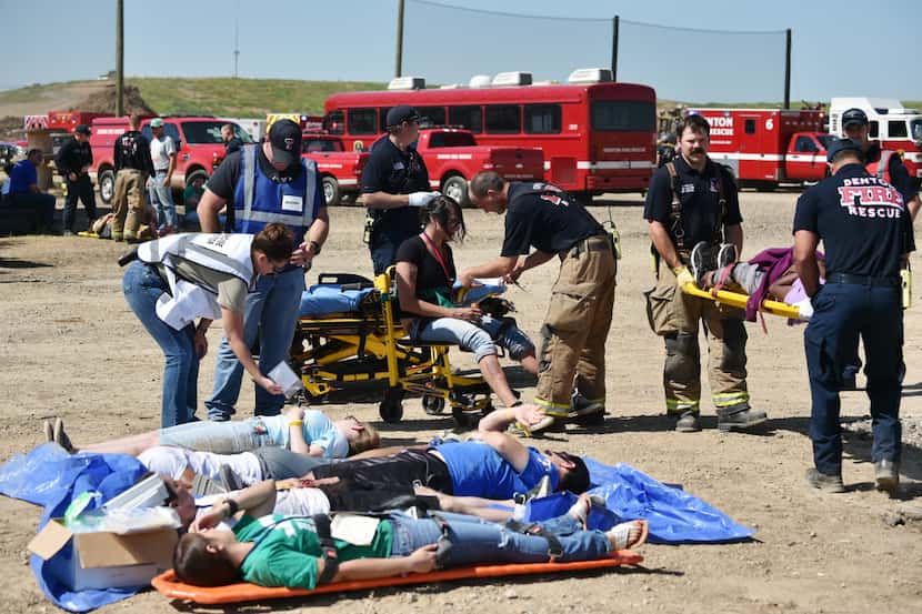 During disaster training, Denton first responders rescue mock victims  at the Denton...