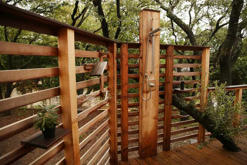 An outdoor shower in the tree house
