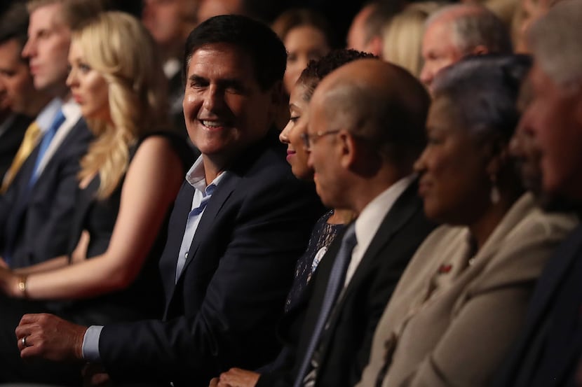 Mark Cuban (left) attended the first presidential debate with Democratic presidential...