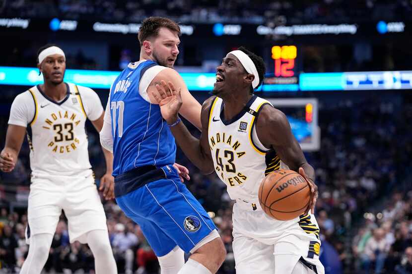 Indiana Pacers forward Pascal Siakam (43) works to the basket against Dallas Mavericks guard...