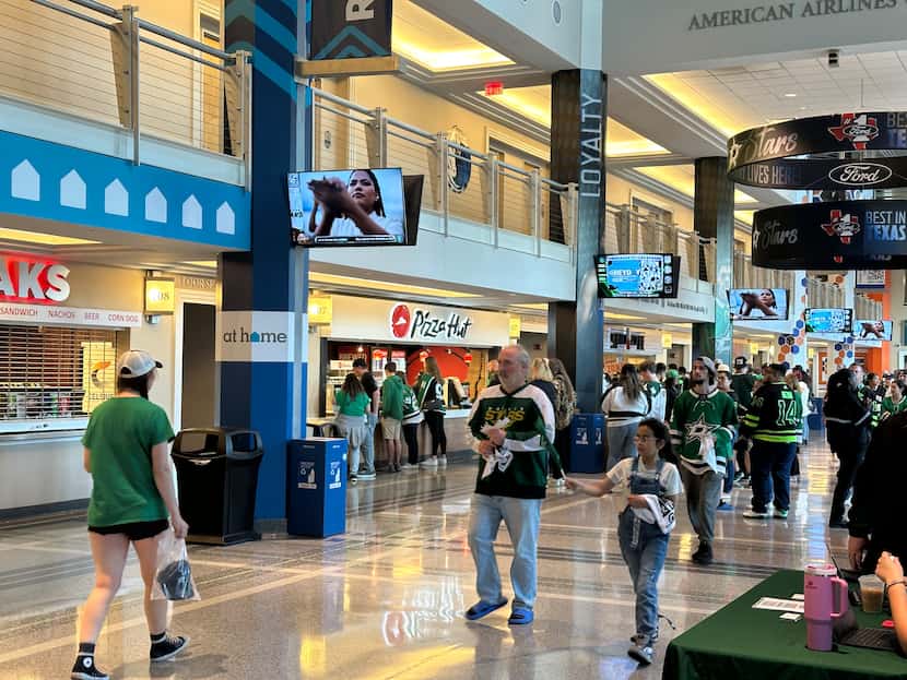 Dallas Stars fans walk to their seats in the American Airlines Center before Game 4 on...