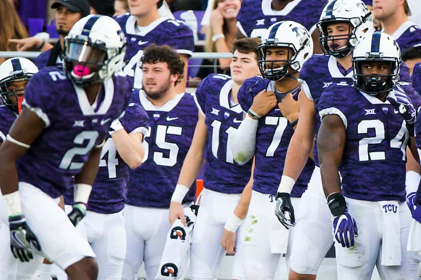 TCU quarterback Kenny Hill (7) watches from the sidelines after being replaced by...