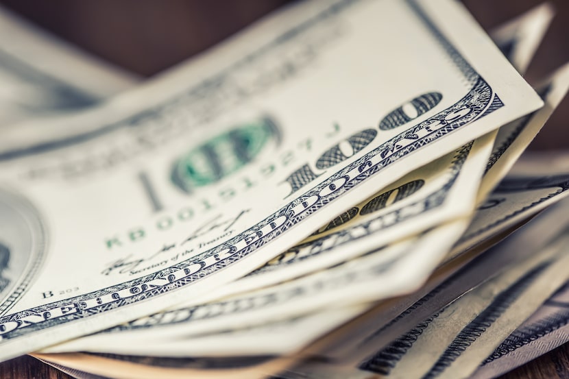 Close-up view of stack of US dollars.