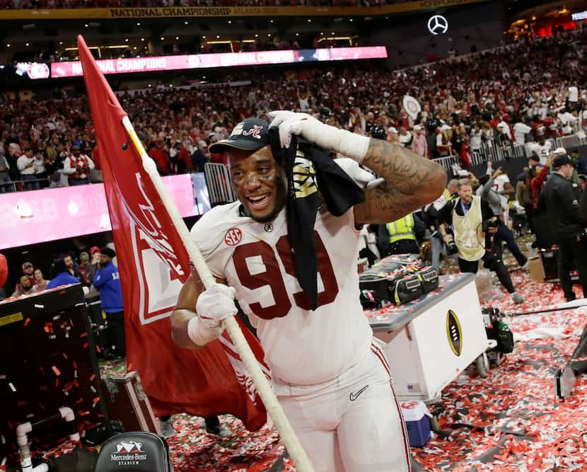 Alabama's Raekwon Davis celebrates after overtime of the NCAA college football playoff...