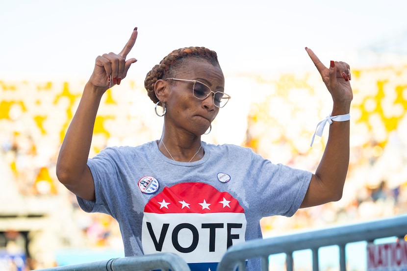 An attendee dances during a rally for Democratic presidential nominee Vice President Kamala...