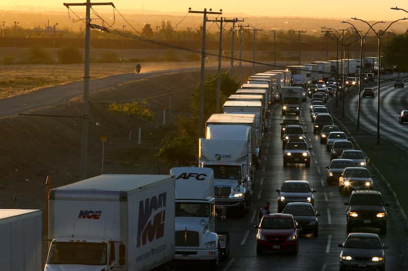 Trucks wait to cross the border with the U.S. in Ciudad Juarez, Mexico, in April. President...