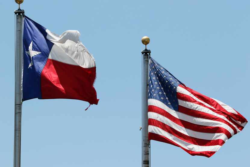 American and Texas flags are flown in Arlington on Monday, July 3, 2017. (David Woo/The...