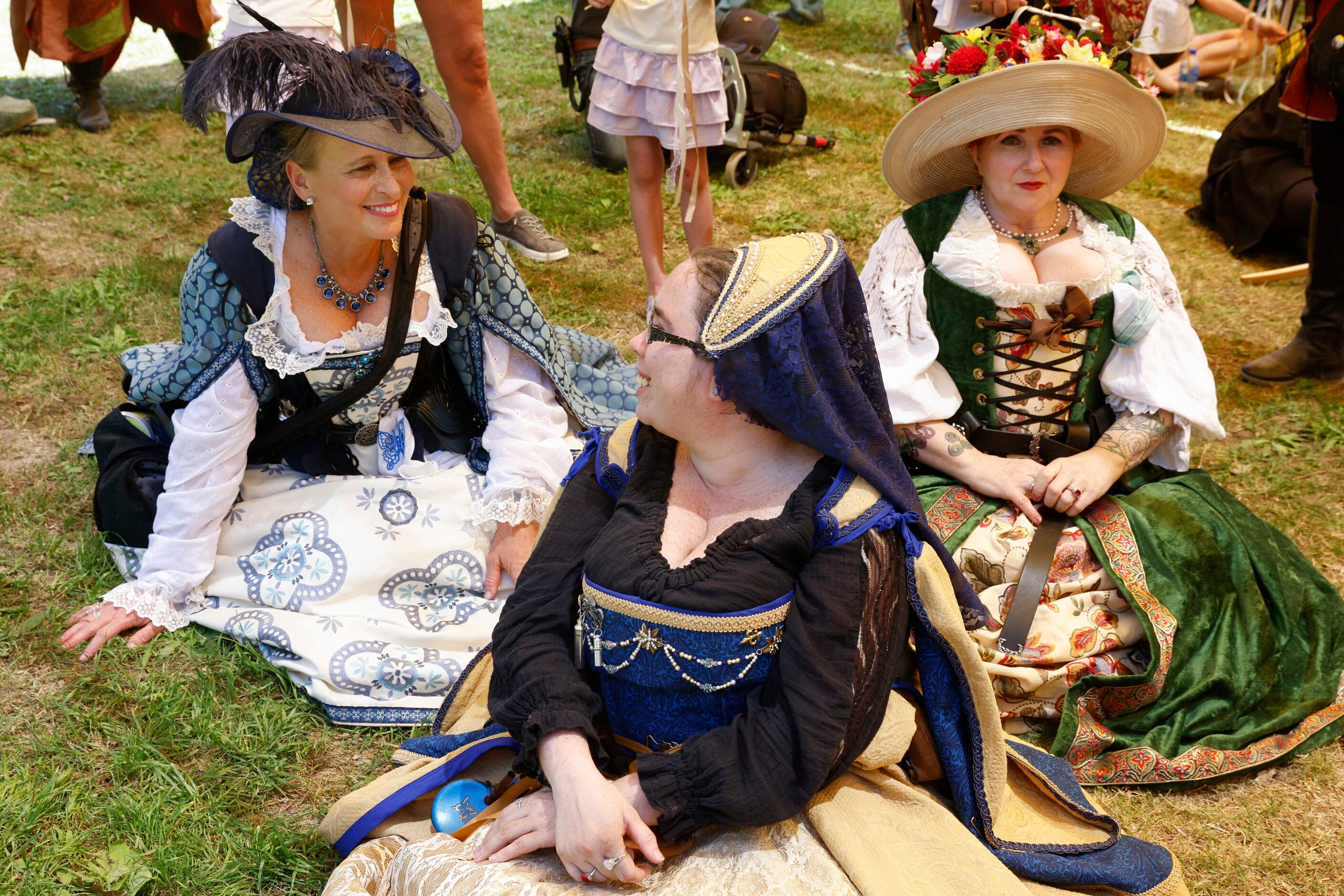 Cast members wait before the act of the Royal Wedding of King Henry VIII and Queen Catherine...