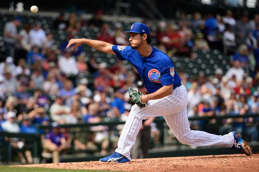 MESA, ARIZONA - FEBRUARY 26: Yu Darvish #11 of the Chicago Cubs delivers a pitch in the...
